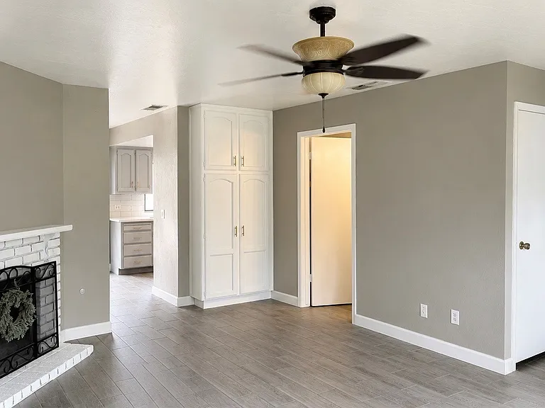 Convenient laundry room with a half bathroom.
