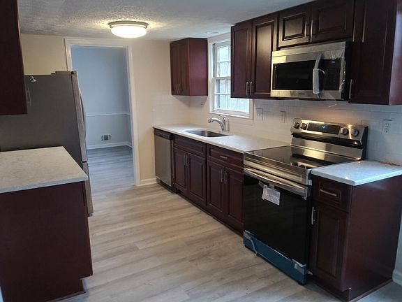 New Kitchen , new flooring thru out both main floor, second floor