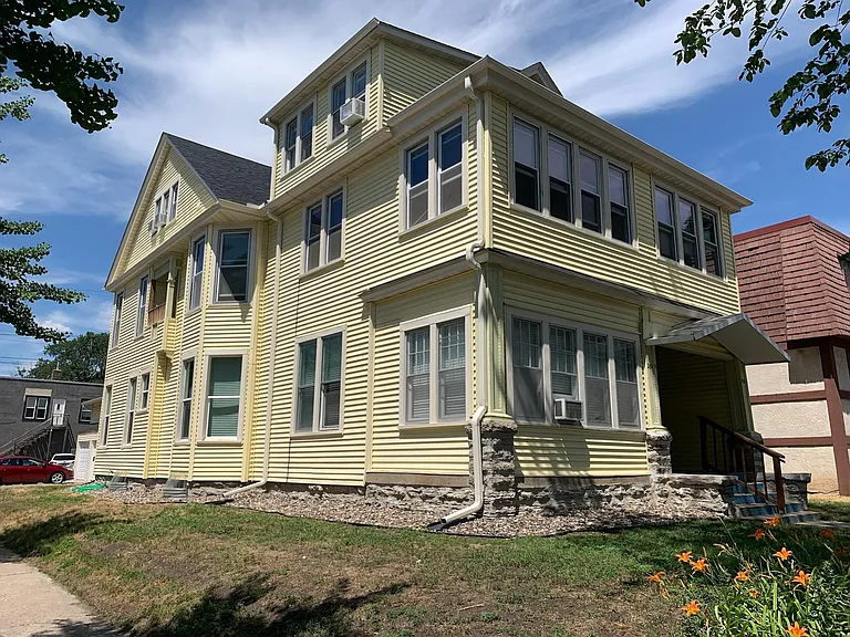 Grand property built by renowned Minneapolis architect and builder Theron Potter Healy, "King of the Queen Anne," with new roof and exterior!
