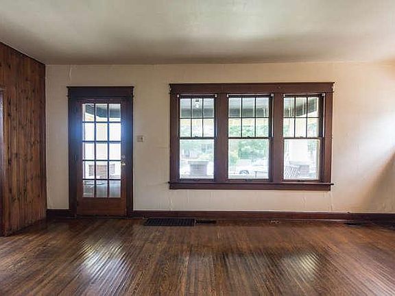 Living room access to front door to porch.