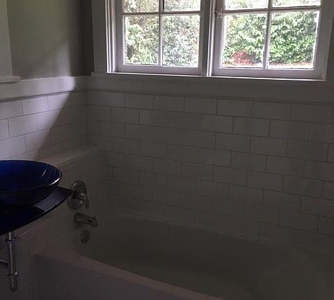 New tiled bathtub.