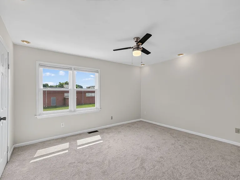 Rear bedroom with ensuite full bath