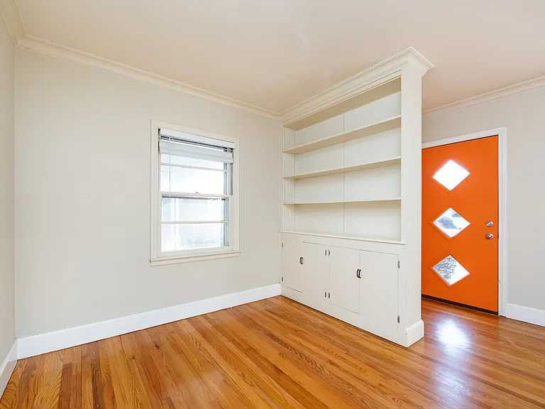 LIVING ROOM, BUILT-IN BOOKSHELF, FRONT DOOR