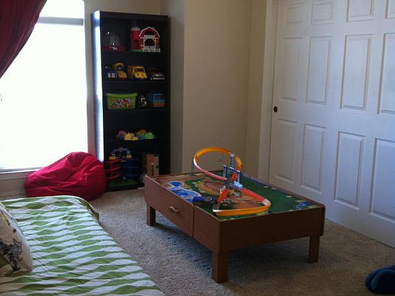 Second bedroom with southern exposure and slide door closet