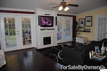 Family Room : French doors open to the wooden deck & large lot.Pretty woodwork & crownmolding.