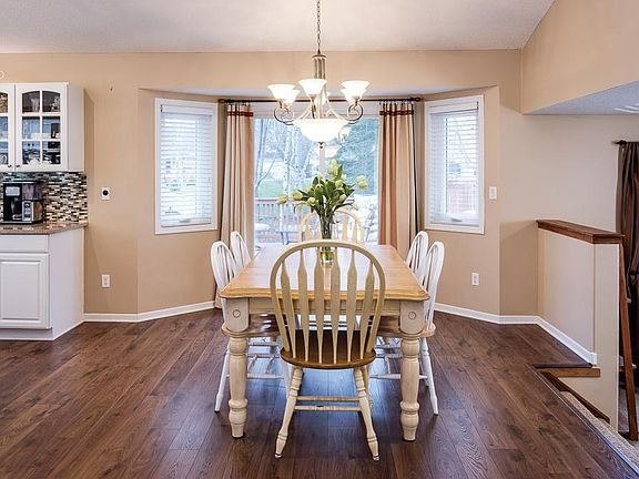 The heart of this home! Enjoy the views, the open floor plan, new flooring and access to the multi-level deck!