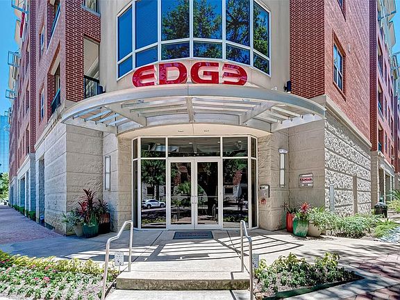 MID RISE CONDO WITHIN WALKING DISTANCE TO RESTAURANTS, COFFEE SHOPS AND BARS