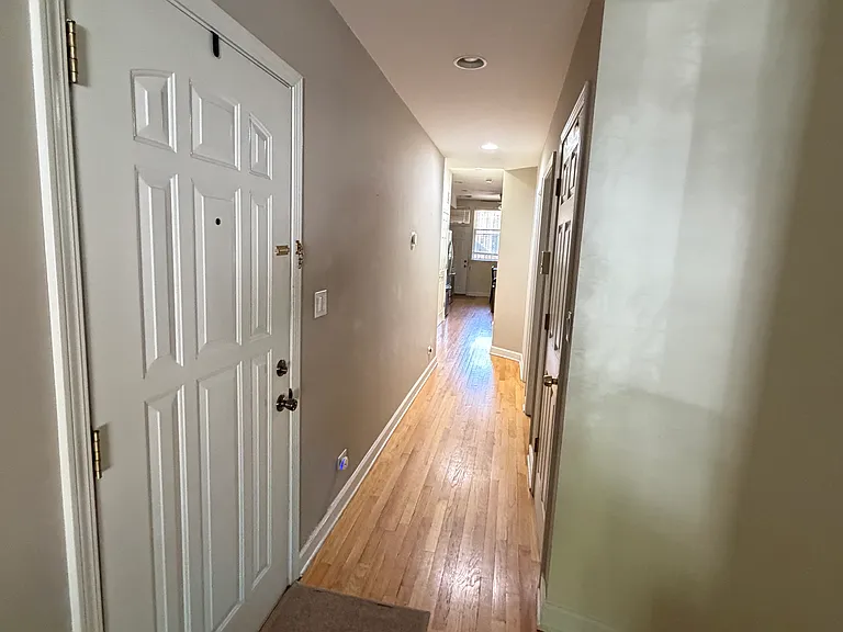 Entry with alcove with spot lighting