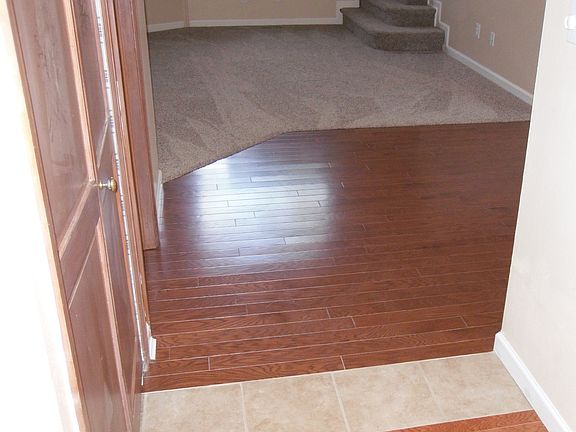 wood floors in kitchen and dining area