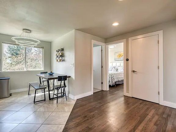 Open hallway with entry to the 2 bedrooms and bathroom on the main floor