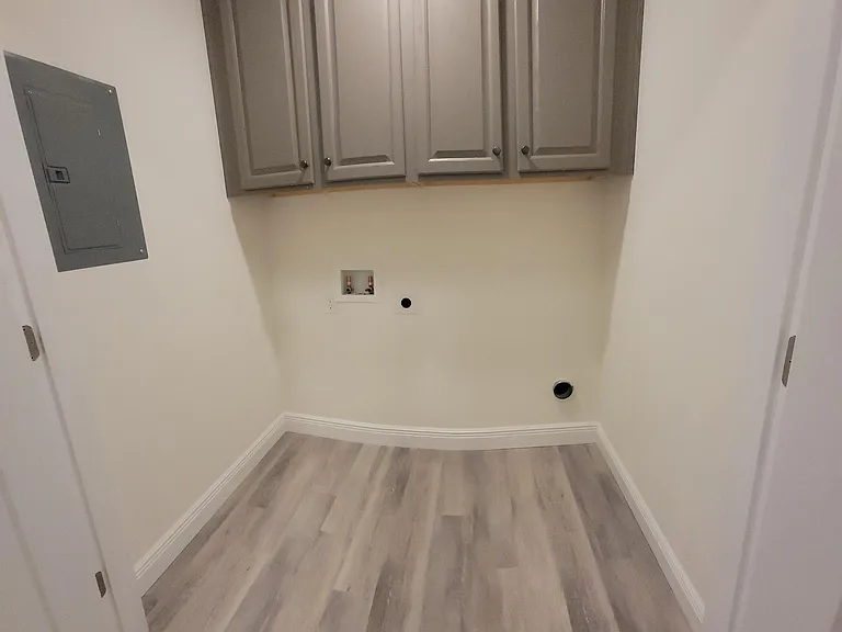 Hall Laundry with extra storage space