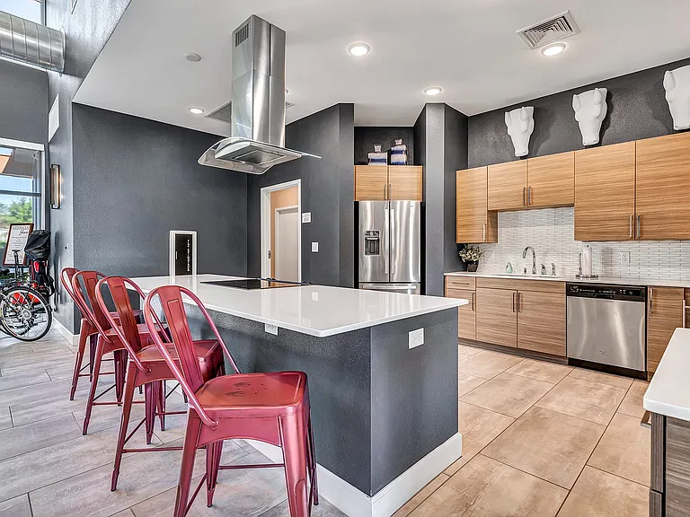 The Kinsley Forest clubhouse is available for resident use, including a full kitchen and coffee bar.