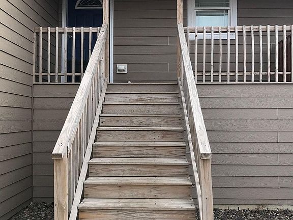 Stairway leading to a comfortable spacious home.