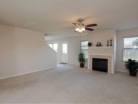 Living area leads into dining area.