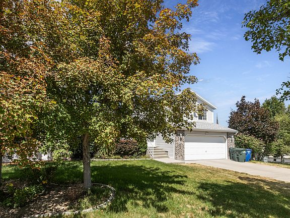 2nd image of 5902 W Wolf Creek Ct S