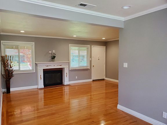 Upon entering the front door-you will feel the coolness of the A/C -you will see the living room with its wood burning fireplace