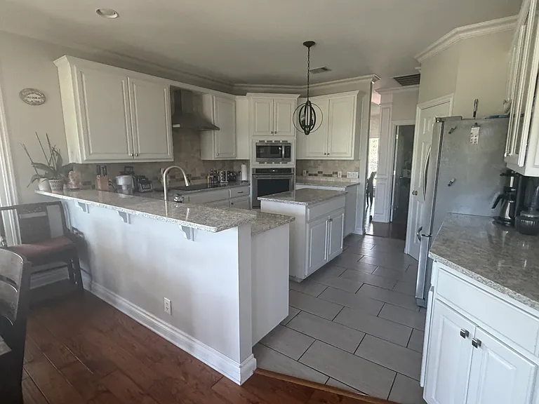 kitchen open to family room and breakfast area