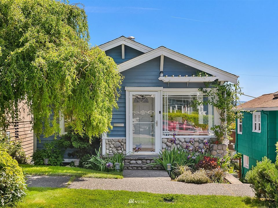 Welcome to the Alaska Junction! This 1919 craftsman home is ready for you! 