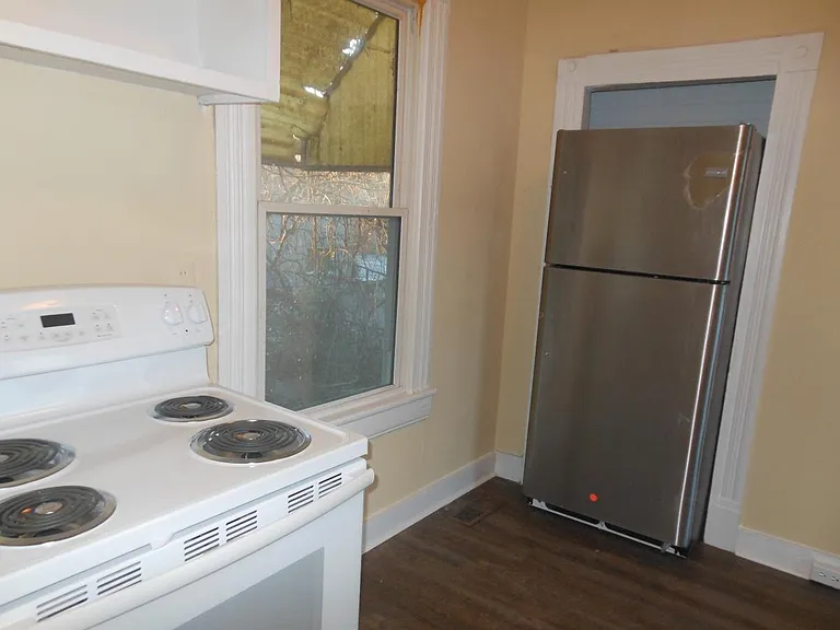 Kitchen--new range and oven, new refrigerator, new flooring, new paint.