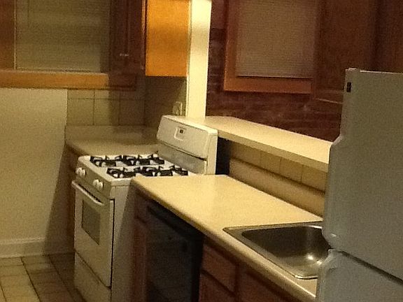 Kitchen opens to dining and living rooms