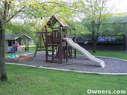 play set, playhouse and back deck