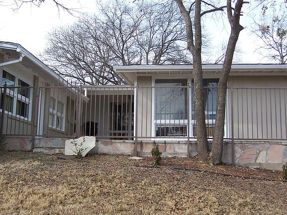 fenced stone patio  (2008)
