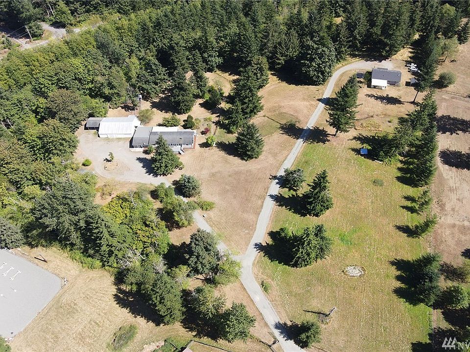  Peace & tranquility on 8.64 acres! Hobby farm, equestrian dreams, Airbnb or multi-generational housing? Beyond the gate you will find 2 homes, a separate studio & 40' x48' garage/shop w/office...and more!