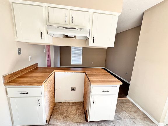 Kitchen cabinets and stove area