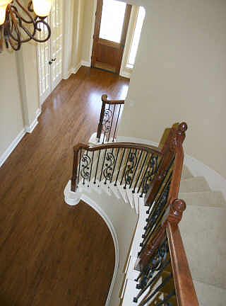 Wind Staircase, hardwood floors downstairs