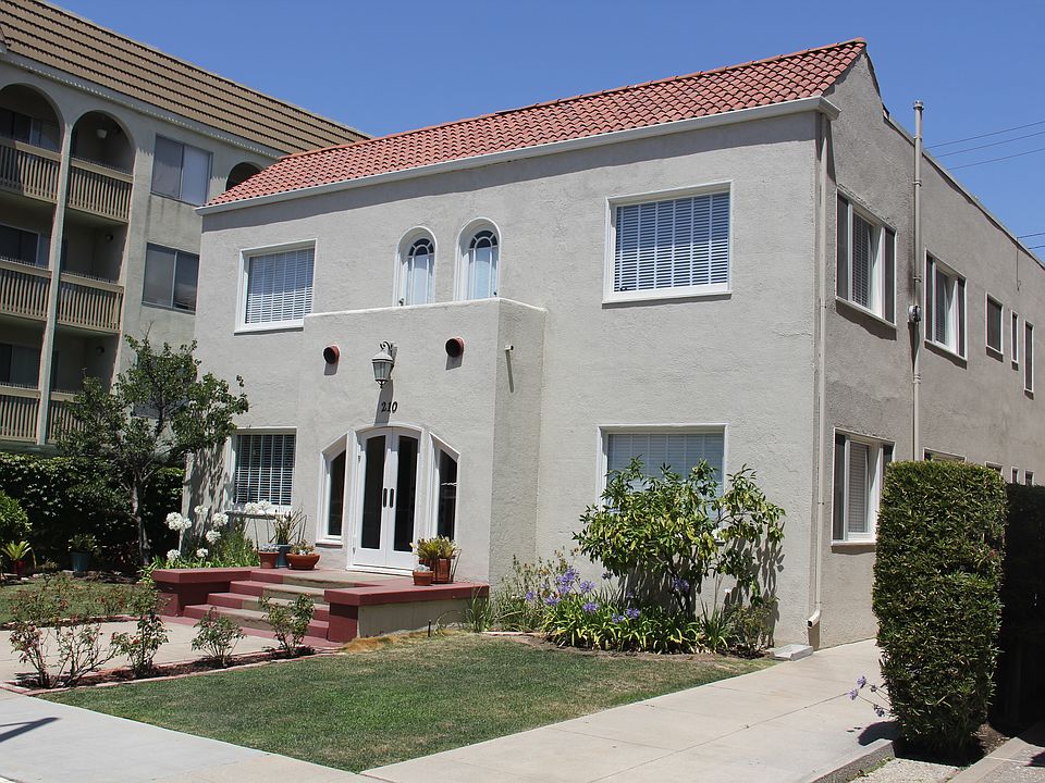 Front yard view of 210 Euclid Avenue with driveway parking place for Unit C. (Unit C is the upper left unit)
