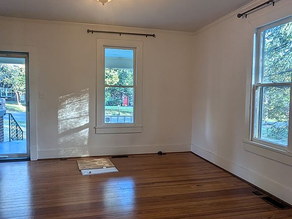 Refinished Heart Pine floors throughout main level. Huge living room.