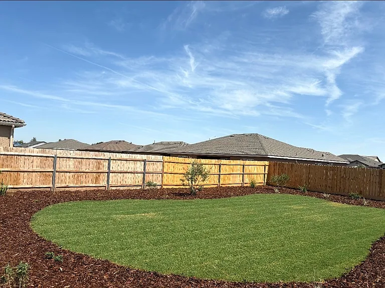 Freshly landscaped backyard. View to the mountains!
