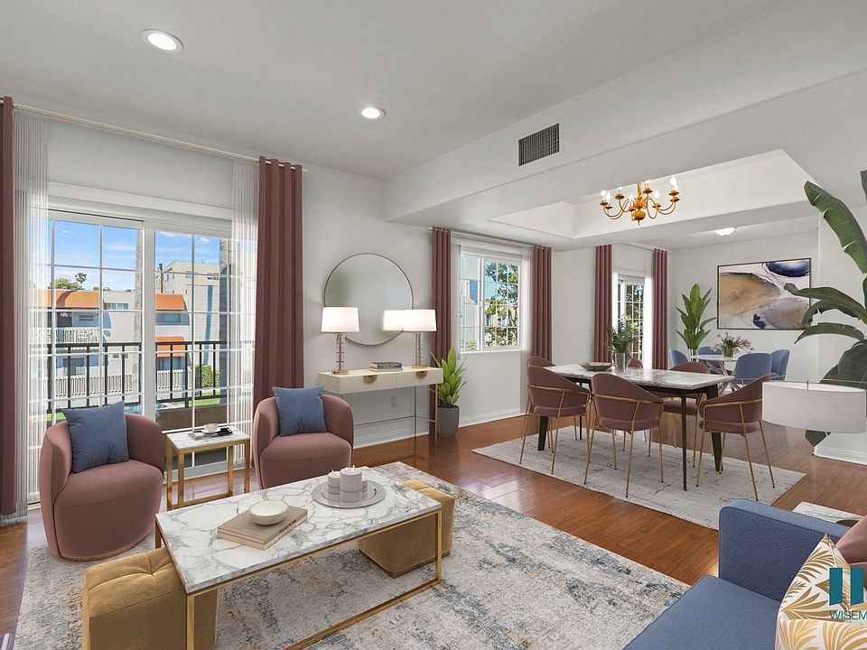 Open-Concept Dining and Living Room with Vinyl Flooring, Recessed Lighting, Balcony, and Large-Size Windows
