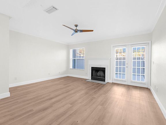 Family room with new flooring and access to your private out door patio