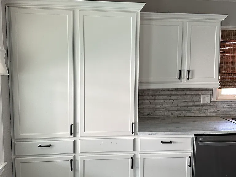 massive white kitchen cabinets upstairs