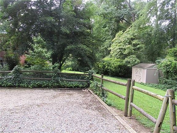 Fenced yard and garden shed