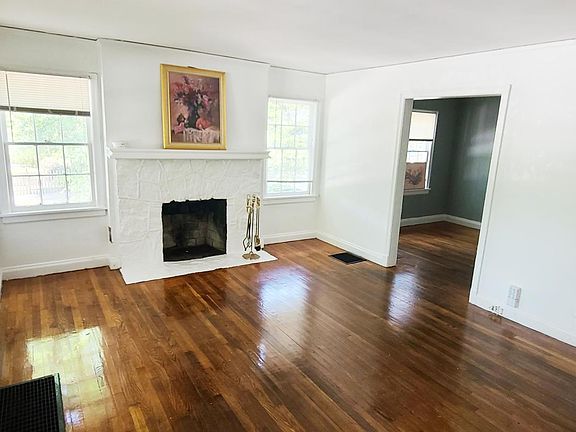 Roomy living room with fireplace