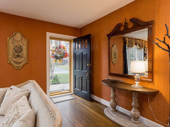 Front door and entry into living room