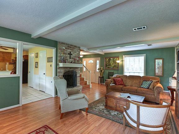 Lovely wood laminate flooring hearth.