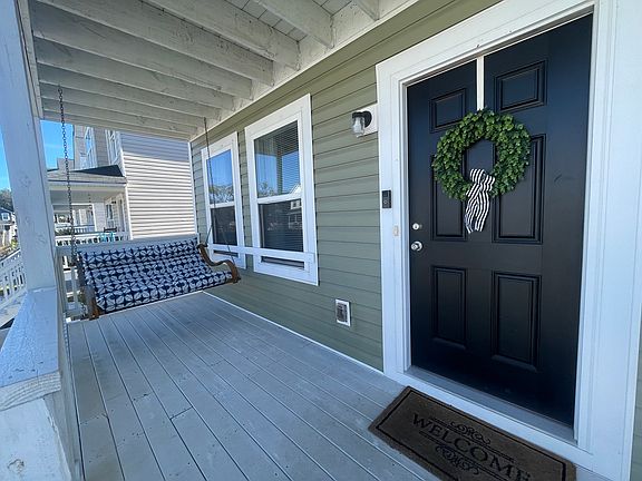 Front porch with relaxing swing