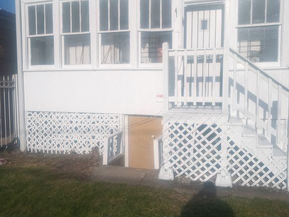 Enclosed back porch.
