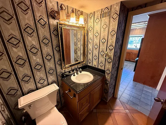 Downstair powder room off of the kitchen.