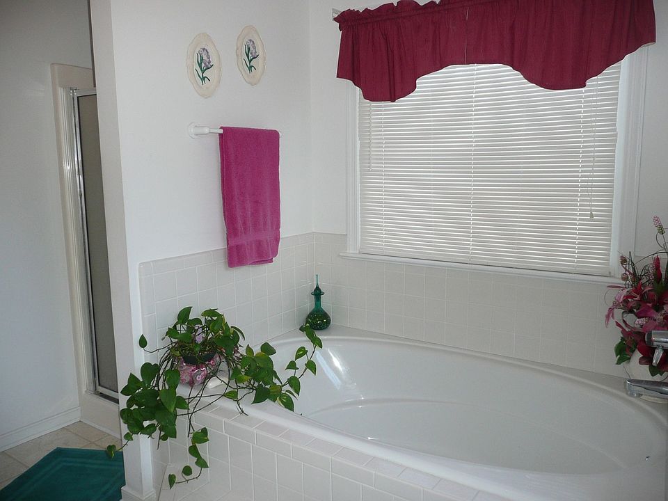 Attached Luxury Master Bath with Garden Tub and Double Vanity
