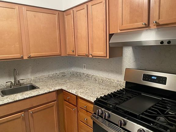 NEW Stainless Steel Fridge & Stove, NEW Counters, Ceramic tile floor,ceramic backspash