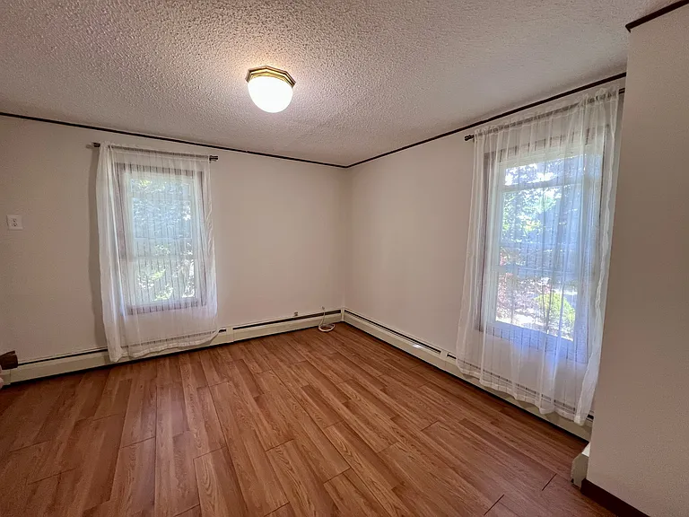 Master bedroom overlooking private yard and gardens