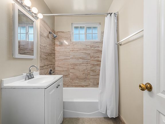 Full Bath, Tiled Walls, Newly Glazed Bath tub.