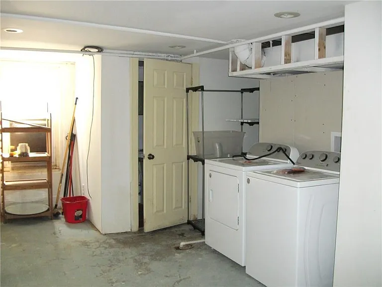 Basement- Washer & Dryer - Refinish and painted.