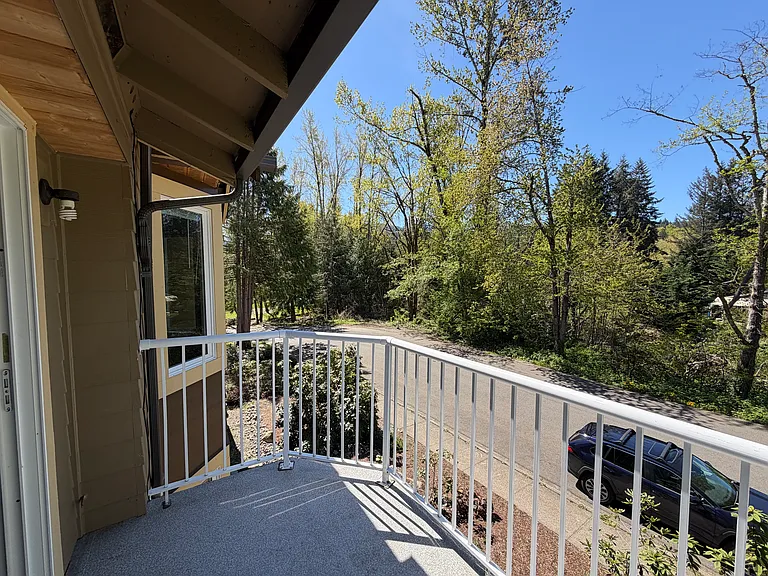 tree house feel from your spacious deck on a quiet corner