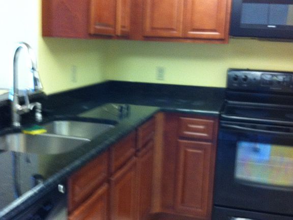 Granite counters and cherry cabinets, new appliances