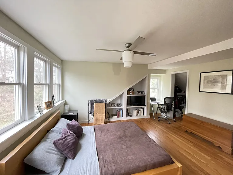 Primary Bedroom with view to one of two closets visible